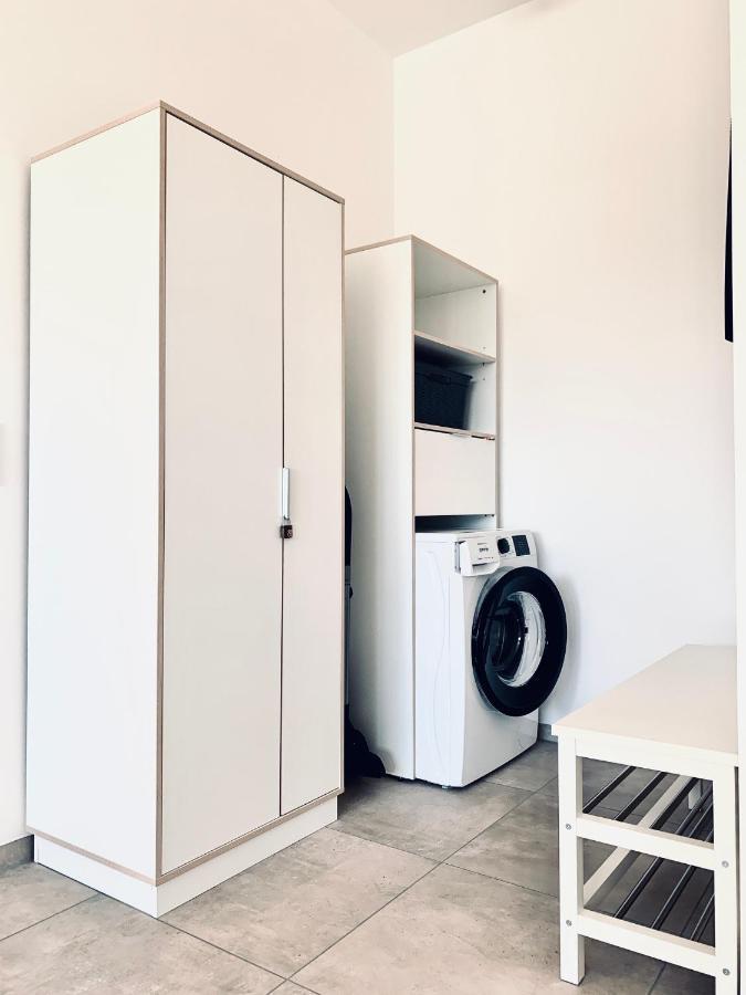 Modernes Apartment Am See Mit Terrasse غروسريشن المظهر الخارجي الصورة