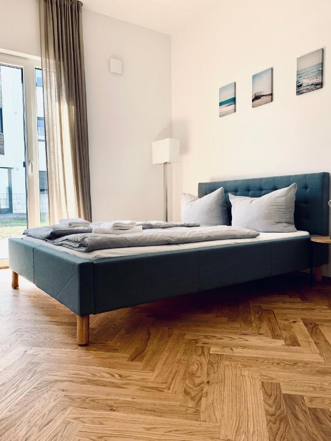 Modernes Apartment Am See Mit Terrasse غروسريشن المظهر الخارجي الصورة